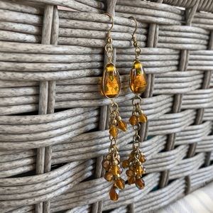 Amber coloured dangly earrings